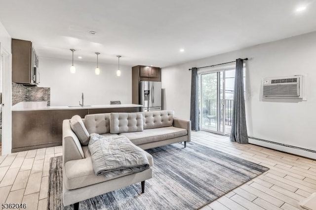 2200 Paterson Plank Rd Unit 23, North Bergen Twp, NJ 07047 - living area with light wood-style flooring, baseboard heating, and recessed lighting