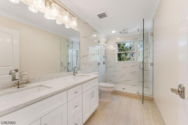 1537 Franklin St, Clark Twp, NJ 07066 - full bathroom with ornamental molding, a marble finish shower, double vanity, toilet, and wood finished floors