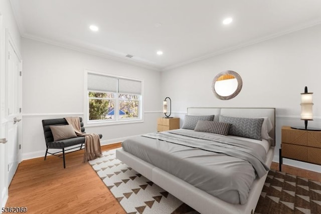 1537 Franklin St, Clark Twp, NJ 07066 - bedroom featuring ornamental molding, light wood-style flooring, recessed lighting, and baseboards
