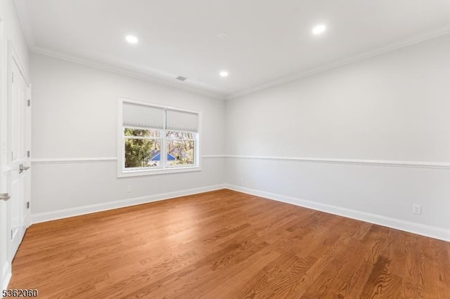 1537 Franklin St, Clark Twp, NJ 07066 - spare room featuring ornamental molding, baseboards, recessed lighting, and wood finished floors