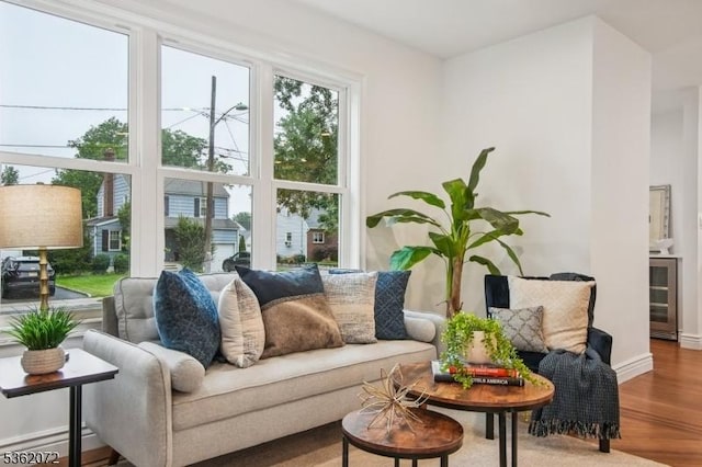 701 High St, Cranford Twp, NJ 07016 - living area with wood finished floors, a baseboard heating unit, and wine cooler