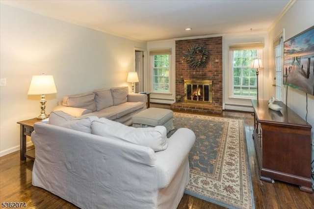 31 Winay Ter, Washington Twp, NJ 07853 - living room featuring a baseboard heating unit, wood finished floors, ornamental molding, and a fireplace