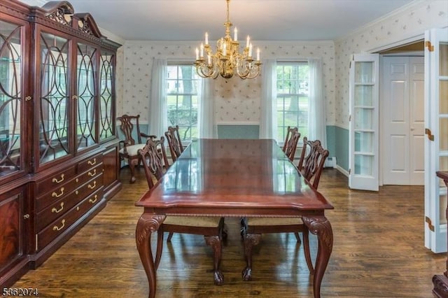 31 Winay Ter, Washington Twp, NJ 07853 - dining space featuring wallpapered walls, crown molding, a chandelier, healthy amount of natural light, and dark wood-type flooring