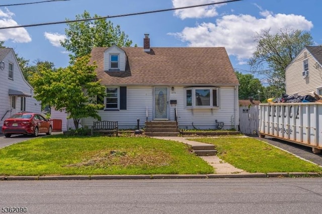 1236 Mayfair Dr, Rahway City, NJ 07065 - cape cod home with a front yard, a chimney, and entry steps