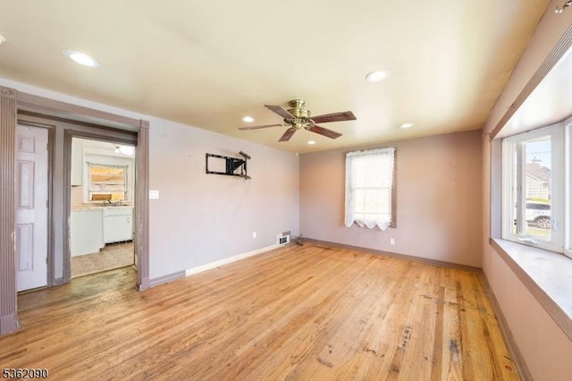 1236 Mayfair Dr, Rahway City, NJ 07065 - empty room featuring plenty of natural light, a ceiling fan, light wood-style floors, baseboards, and recessed lighting