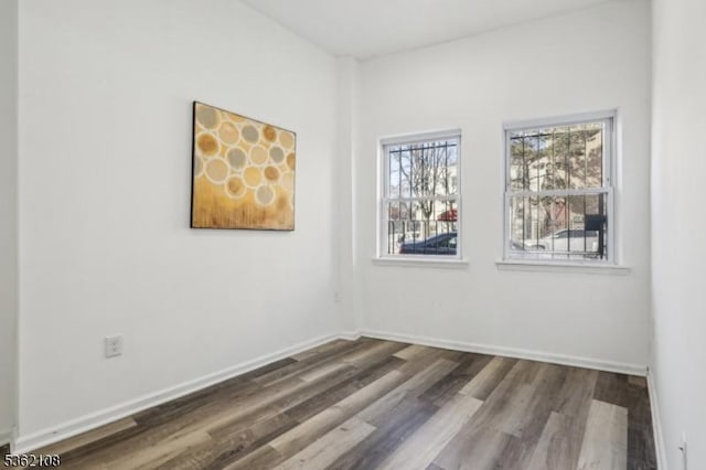 430 Ocean Ave, Jersey City, NJ 07305 - spare room featuring dark wood finished floors and baseboards