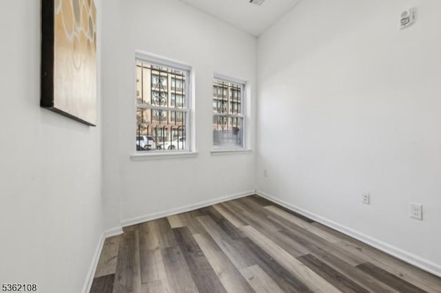430 Ocean Ave, Jersey City, NJ 07305 - unfurnished room featuring wood finished floors and baseboards