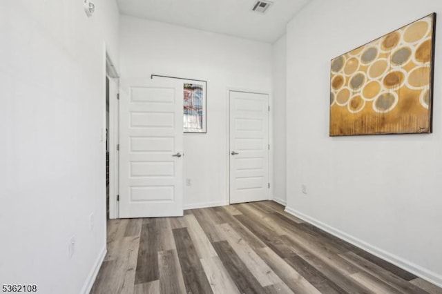 430 Ocean Ave, Jersey City, NJ 07305 - hallway featuring wood finished floors and baseboards