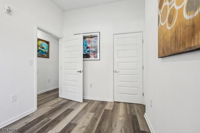 430 Ocean Ave, Jersey City, NJ 07305 - unfurnished bedroom featuring wood finished floors and baseboards