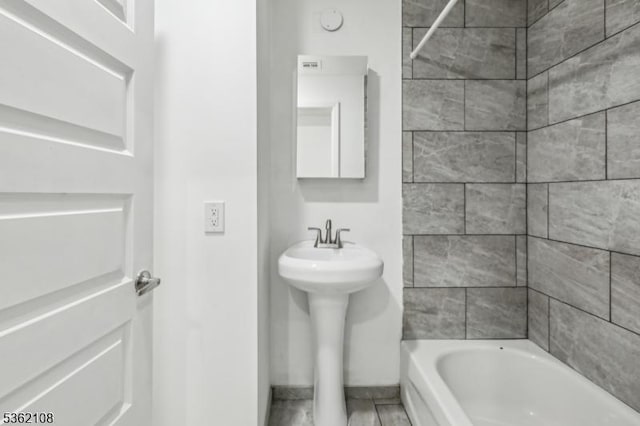 430 Ocean Ave, Jersey City, NJ 07305 - full bathroom with a sink, shower / bath combination, and baseboards