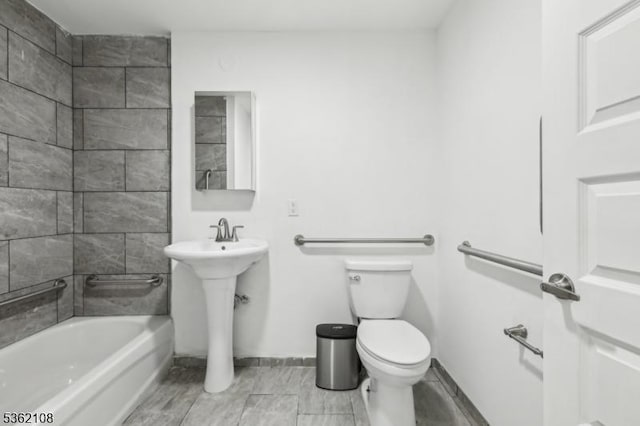 430 Ocean Ave, Jersey City, NJ 07305 - full bath featuring toilet, baseboards, a sink, and shower / washtub combination