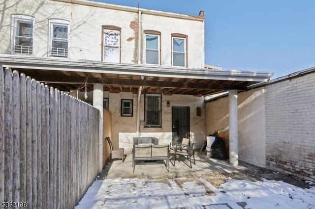 430 Ocean Ave, Jersey City, NJ 07305 - rear view of house with outdoor lounge area, a patio, and stucco siding