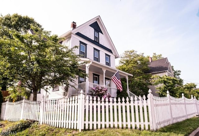 24 Ryerson Ave, Newton Town, NJ 07860 - view of front of property with a porch, a fenced front yard, and a chimney