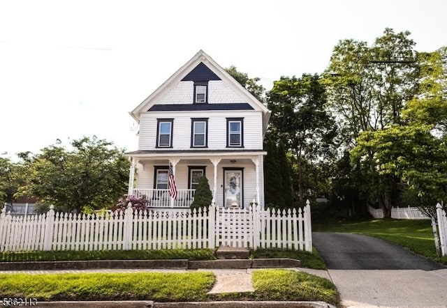 24 Ryerson Ave, Newton Town, NJ 07860 - victorian-style house with covered porch and a fenced front yard
