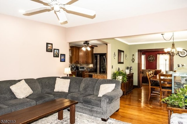 24 Ryerson Ave, Newton Town, NJ 07860 - living area featuring a ceiling fan, light wood finished floors, and a chandelier