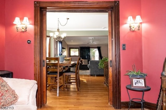 24 Ryerson Ave, Newton Town, NJ 07860 - dining space with wood finished floors, a chandelier, and ceiling fan