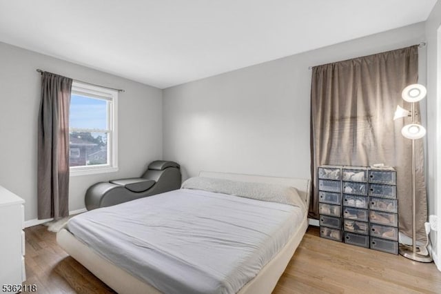 1105 Essex Ave Unit 2, Linden City, NJ 07036 - bedroom with wood finished floors and baseboards