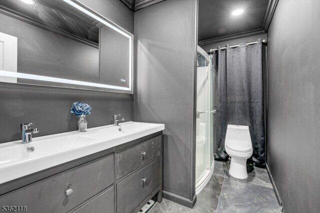 1105 Essex Ave Unit 2, Linden City, NJ 07036 - bathroom featuring toilet, marble tiled flooring, double vanity, a shower stall, and baseboards