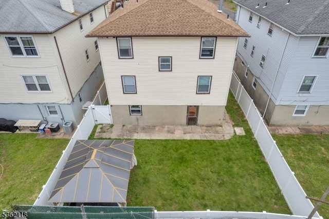 1105 Essex Ave Unit 2, Linden City, NJ 07036 - rear view of property with a gate, roof with shingles, and a patio