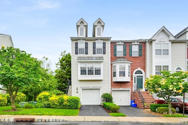 231 Swathmore Dr, Nutley Twp, NJ 07110 - multi unit property featuring driveway and a garage