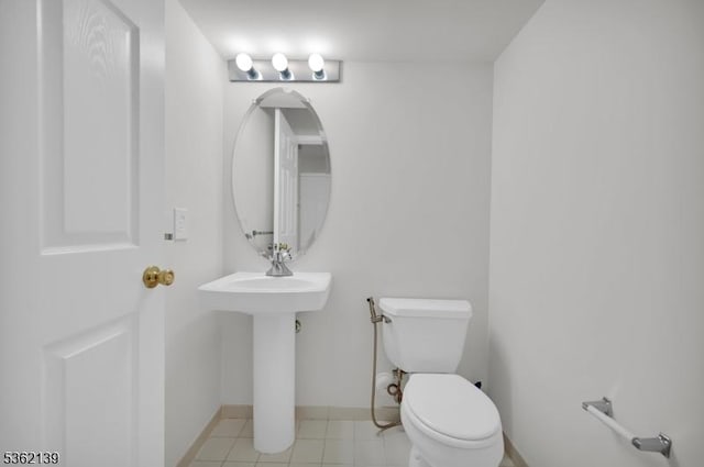 231 Swathmore Dr, Nutley Twp, NJ 07110 - half bath with toilet and tile patterned flooring
