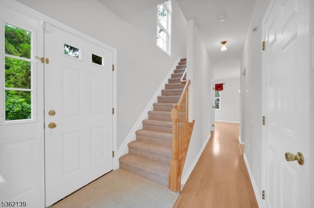 231 Swathmore Dr, Nutley Twp, NJ 07110 - entryway with stairway and light wood finished floors