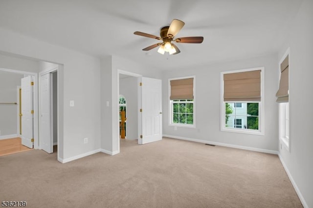 231 Swathmore Dr, Nutley Twp, NJ 07110 - unfurnished bedroom featuring light colored carpet, ensuite bath, and ceiling fan