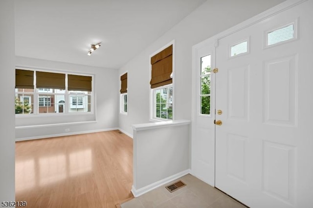 231 Swathmore Dr, Nutley Twp, NJ 07110 - entrance foyer featuring baseboards and light wood-style flooring
