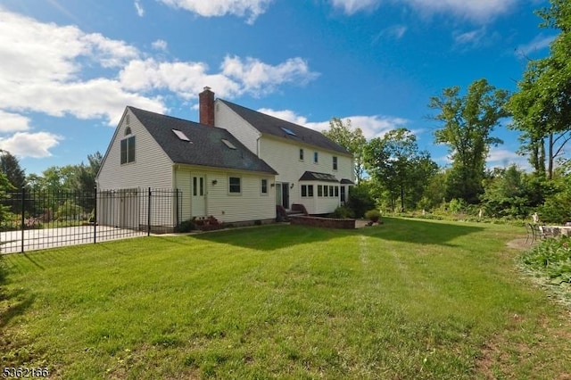 1 Willow Brook Ln, Clinton Twp, NJ 08801 - back of house with a chimney, driveway, and a garage
