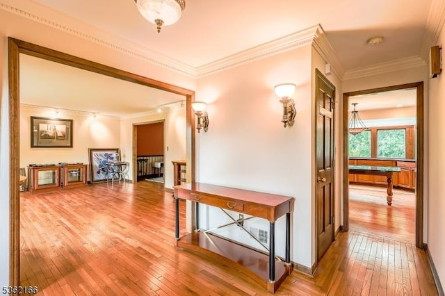 1 Willow Brook Ln, Clinton Twp, NJ 08801 - hall featuring ornamental molding, light wood-style floors, and radiator heating unit