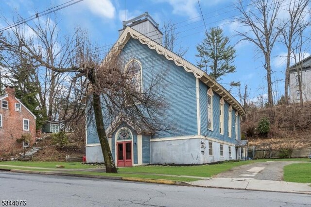 192 Market St, Belvidere Twp, NJ 07823 - view of front of home with a front lawn