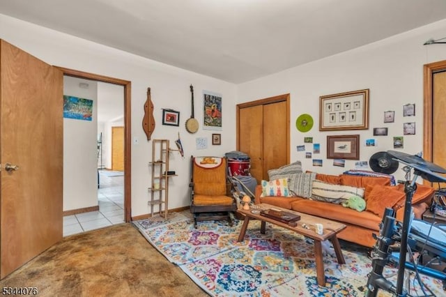 192 Market St, Belvidere Twp, NJ 07823 - living area with tile patterned flooring, carpet flooring, and baseboards