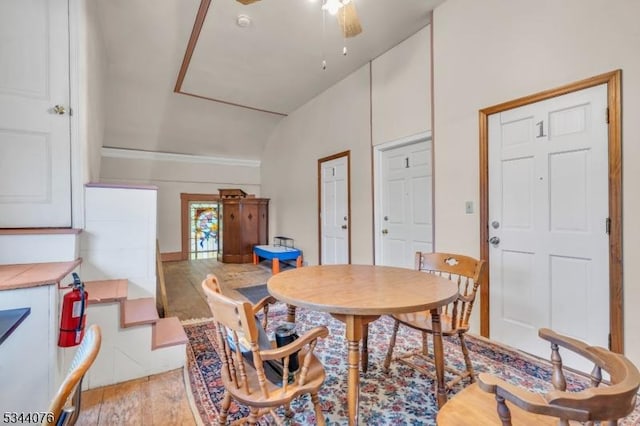 192 Market St, Belvidere Twp, NJ 07823 - dining room featuring light wood finished floors, vaulted ceiling, and a ceiling fan