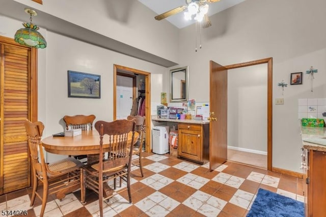 192 Market St, Belvidere Twp, NJ 07823 - dining room with a ceiling fan, light tile patterned flooring, a high ceiling, and baseboards