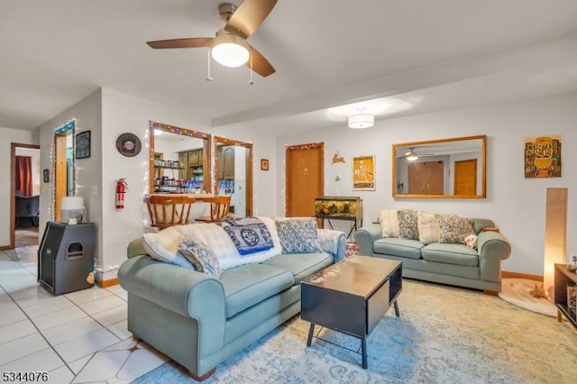 192 Market St, Belvidere Twp, NJ 07823 - living area with a ceiling fan, baseboards, and light tile patterned flooring