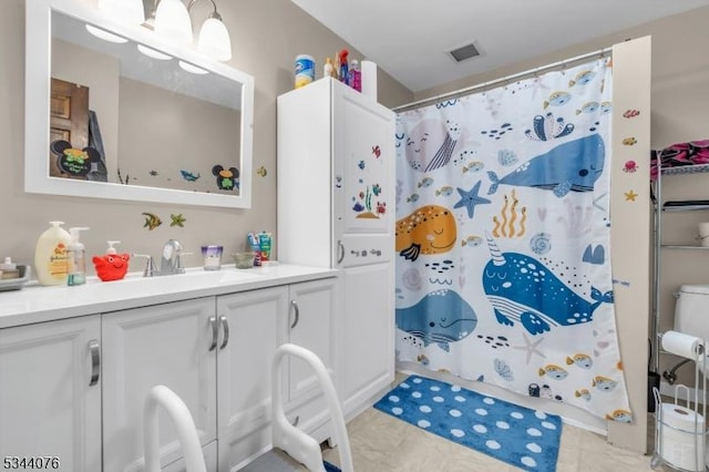 192 Market St, Belvidere Twp, NJ 07823 - full bath featuring vanity, tile patterned flooring, curtained shower, and toilet