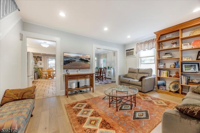 136 Pershing Ave, Nutley Twp, NJ 07110 - living room featuring light wood-style flooring, a wall mounted air conditioner, and recessed lighting