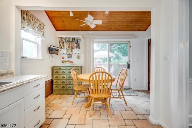 136 Pershing Ave, Nutley Twp, NJ 07110 - dining room with wood ceiling, plenty of natural light, lofted ceiling, ceiling fan, and light stone finish flooring