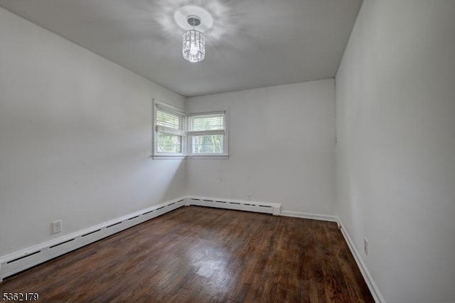 457 Central Ave, New Providence Boro, NJ 07974 - spare room featuring wood finished floors, a baseboard radiator, and baseboards