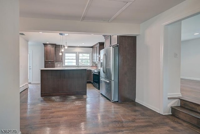 457 Central Ave, New Providence Boro, NJ 07974 - kitchen with stainless steel refrigerator with ice dispenser, range, light countertops, dark wood finished floors, and baseboards