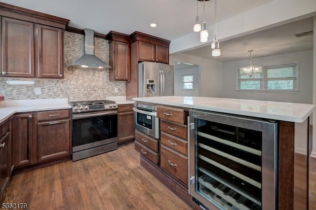 457 Central Ave, New Providence Boro, NJ 07974 - kitchen with stainless steel appliances, wall chimney range hood, wine cooler, dark wood-style flooring, and light countertops
