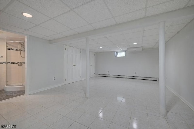 457 Central Ave, New Providence Boro, NJ 07974 - below grade area featuring a baseboard radiator, a drop ceiling, baseboards, and recessed lighting