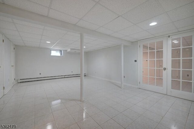 457 Central Ave, New Providence Boro, NJ 07974 - below grade area with a baseboard radiator, a paneled ceiling, and recessed lighting