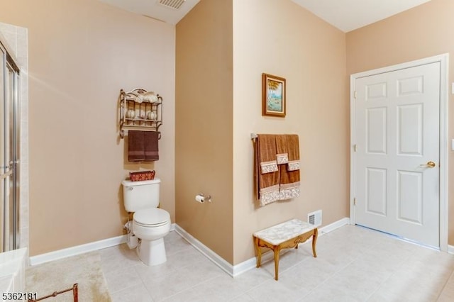 24 Quartz Way, Woodland Park, NJ 07424 - full bath with toilet, a shower with shower door, baseboards, and tile patterned flooring