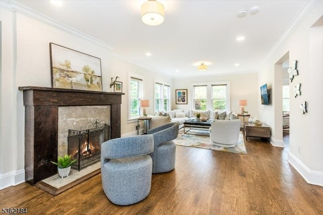 5 Canterbury Dr, Montclair Twp, NJ 07042 - living area with crown molding, a tiled fireplace, wood finished floors, baseboards, and recessed lighting