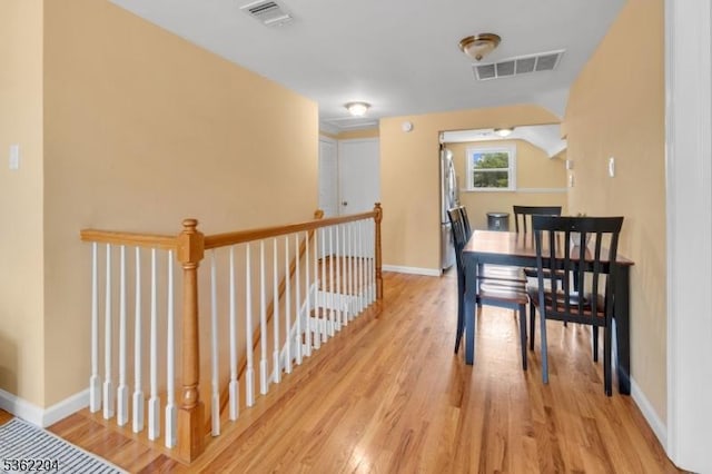 280 Highland Ave Unit 3, Kearny Town, NJ 07032 - hallway with wood finished floors and an upstairs landing