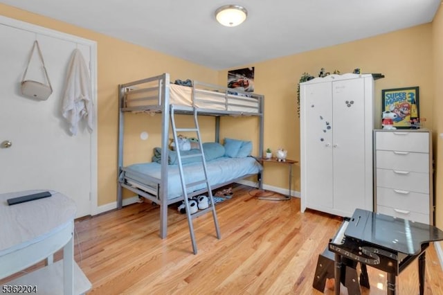 280 Highland Ave Unit 3, Kearny Town, NJ 07032 - bedroom with light wood-type flooring and baseboards