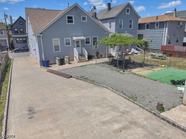280 Highland Ave Unit 3, Kearny Town, NJ 07032 - rear view of property featuring a patio area and entry steps