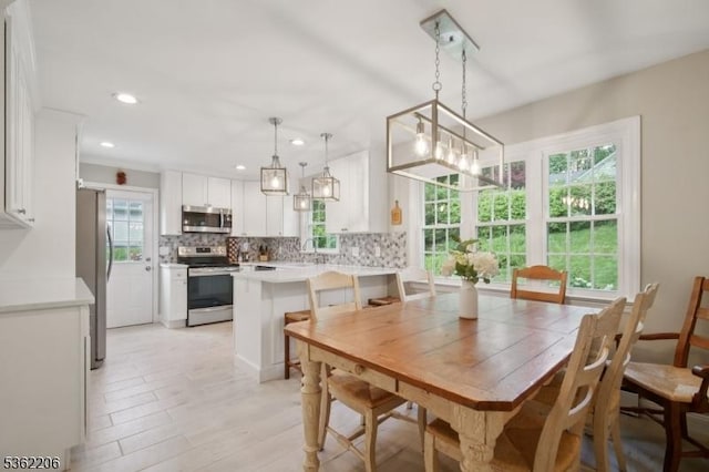 11 Western Blvd, Long Hill Twp, NJ 07933 - dining area with healthy amount of natural light and recessed lighting