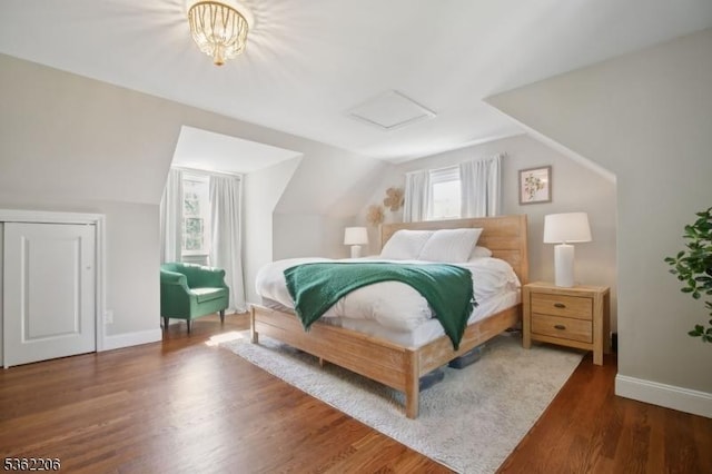 11 Western Blvd, Long Hill Twp, NJ 07933 - bedroom featuring wood finished floors, baseboards, attic access, and vaulted ceiling